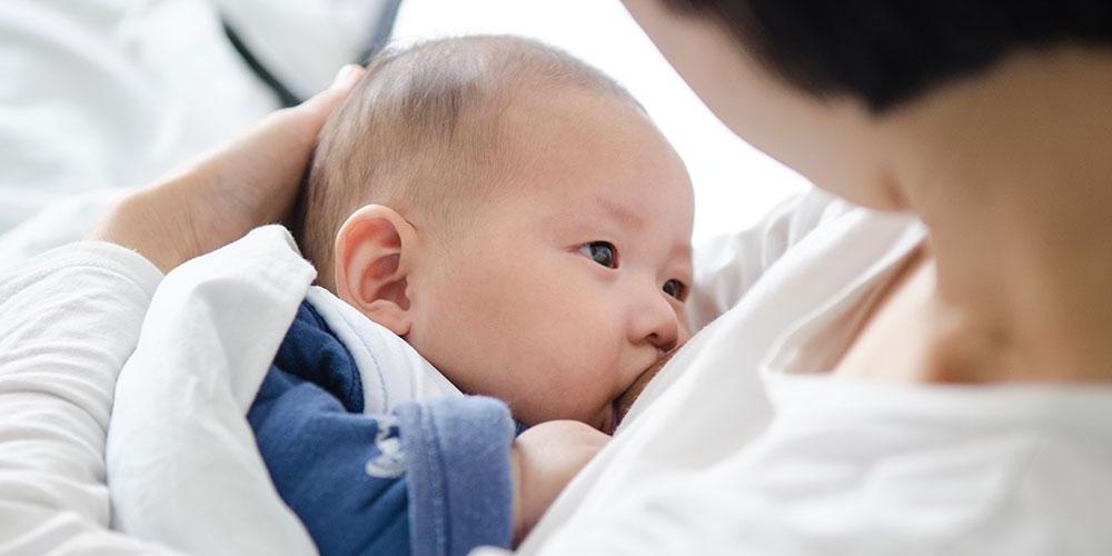 Woman breastfeeding her baby