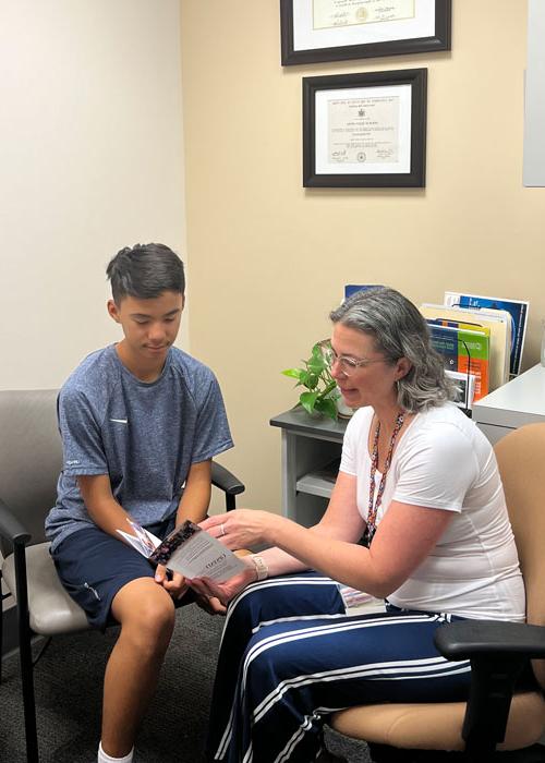 Doctor and patient in clinical office setting